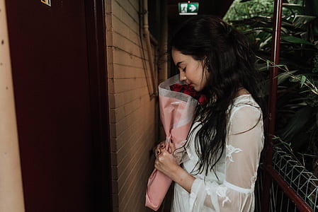 woman standing in front of door thumbnail