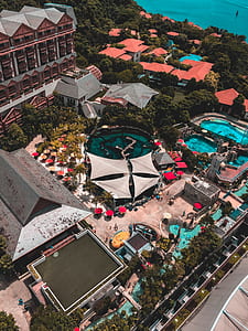 aerial photography of building and recreational park thumbnail