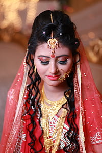 Selective Focus Photography of Woman Wearing Traditional Dress With Gold-colored Accessories thumbnail
