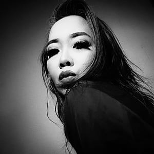 grayscale photo of woman wearing black eye lashes thumbnail