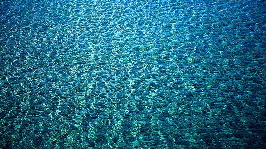 blue and green body of water at daytime thumbnail