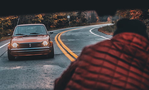 brown car on road thumbnail
