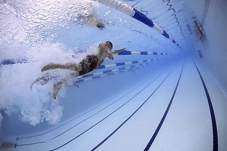 man swimming under pool thumbnail