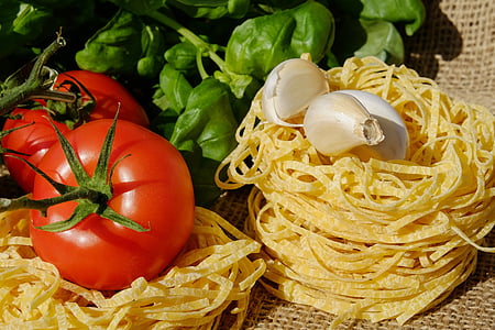 two red tomatoes and white garlic thumbnail