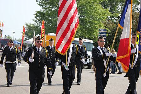 group of men holding flags thumbnail