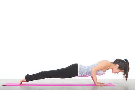 woman wearing grey shirt taking push up thumbnail