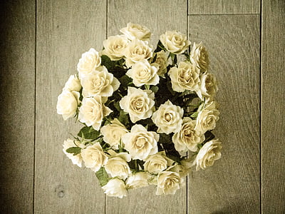 ball bouquet of white petaled flowers thumbnail