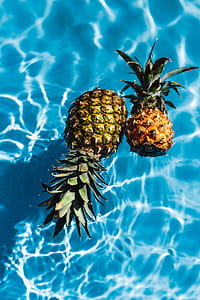 Pineapple in a swimming pool thumbnail