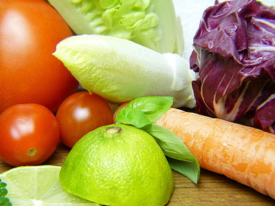 sliced green fruit beside orange carrot thumbnail