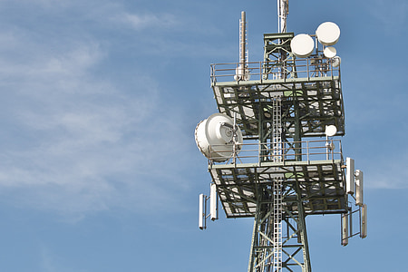 network signal antenna under cloudy sky thumbnail