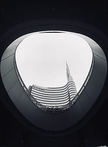 low angle photography of white concrete building thumbnail