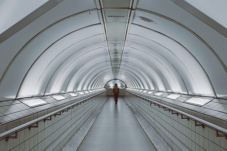 person standing inside tunnel thumbnail
