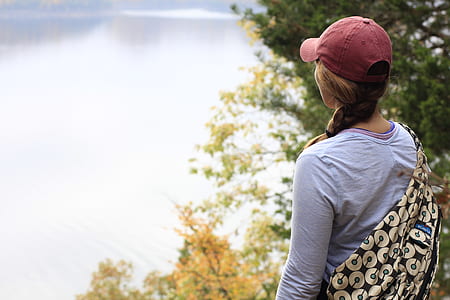 woman looking at lake thumbnail