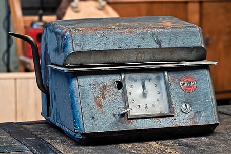 closed gray metal container on black tabletop thumbnail