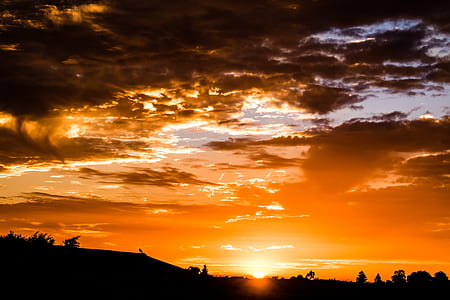 silhouette of mountain during golden hours thumbnail
