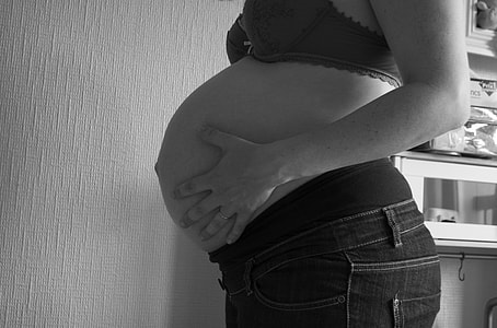 grayscale photo of woman standing thumbnail