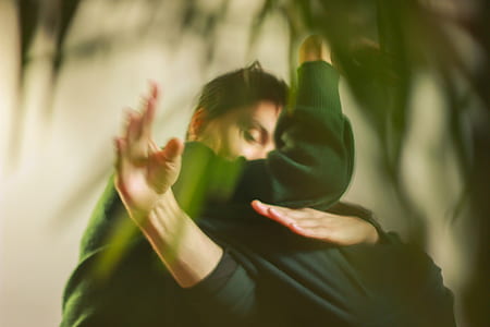 person in green textle thumbnail