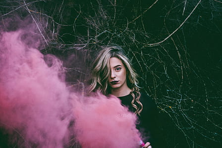 woman covered with pink smoke thumbnail