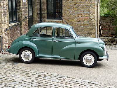 classic green sedan near the house thumbnail