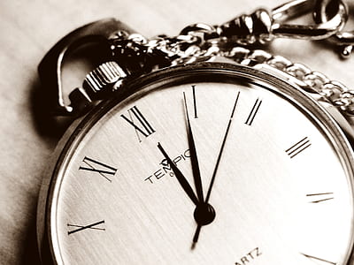 grayscale photo of a pocket watch at 12:04:04 thumbnail