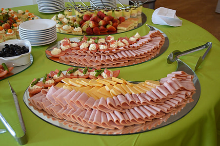 table of sliced hams and cheese thumbnail