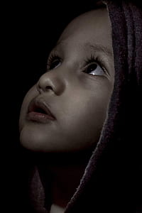 child with scarf looking up thumbnail