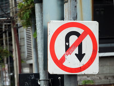 No U Turn Road Sign in Urban Setting thumbnail