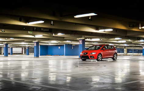 red SUV inside building thumbnail