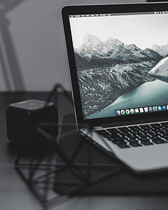 black and grey laptop computer turned on thumbnail