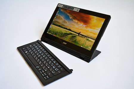 turned on black Acer laptop computer thumbnail