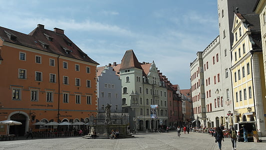 people walking towards buildings thumbnail