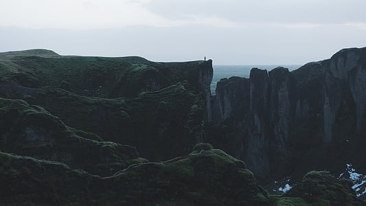 rock cliff near the shore thumbnail
