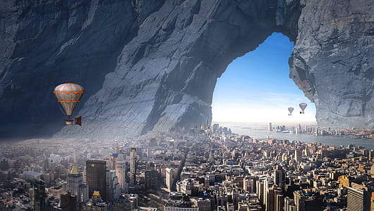 hot air balloons top of city buildings during daytime thumbnail