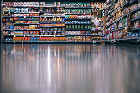 low angle photography of grocery store shelves thumbnail