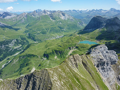 green mountain under blue sky thumbnail