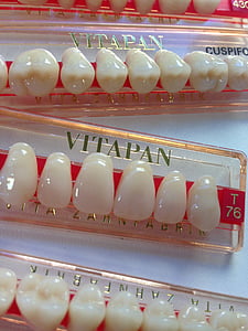 white teeth lot on white surface thumbnail