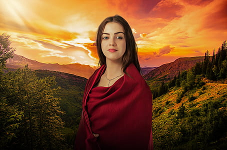 woman standing near trees thumbnail