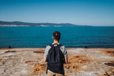 Man looking out to sea thumbnail