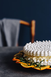 Meringue Cake with whipped cream and oranges thumbnail