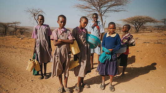 group of children in front of tree thumbnail