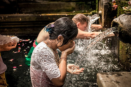 man and woman taking bath thumbnail