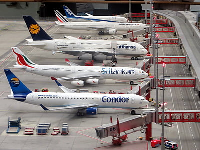 white and blue Condor airplane thumbnail
