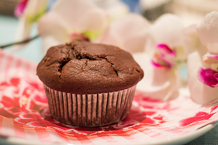 brown cupcake on white ceramic plate thumbnail