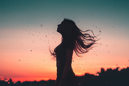 woman standing during golden hour thumbnail
