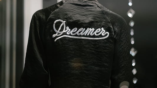 person wearing black and white Dreamer top thumbnail