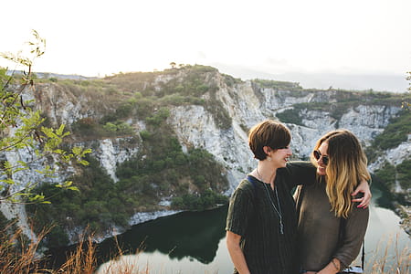 Two Woman Standing on a Cliff thumbnail