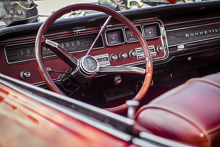 selective focus photography of brown car steering wheel thumbnail