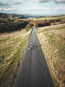 two person standing on road thumbnail