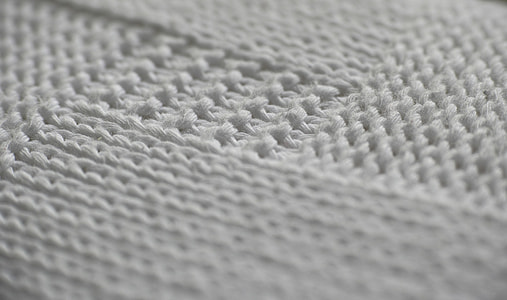 closeup photo of white textile thumbnail