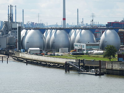 industrial building near body of water thumbnail